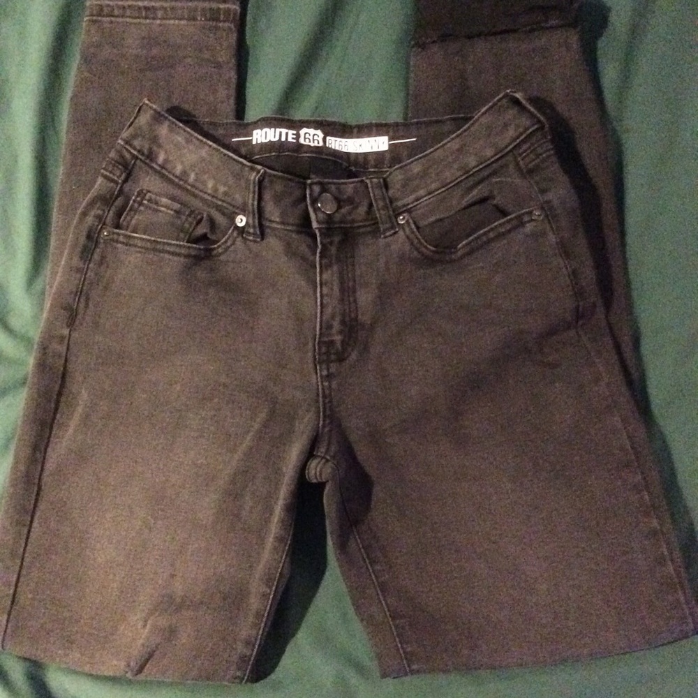 Black jeans with distressed knees